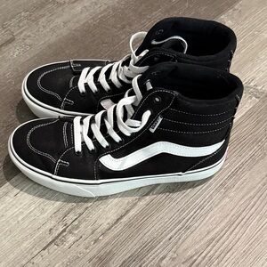 Vans women’s Black and White High-Top Sneakers